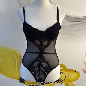 Forever 21 lingerie one piece. Lace and mesh.  Size small.  Adjustable straps.